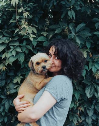 woman in gray t-shirt holding brown short coated dog, Woof Mastery